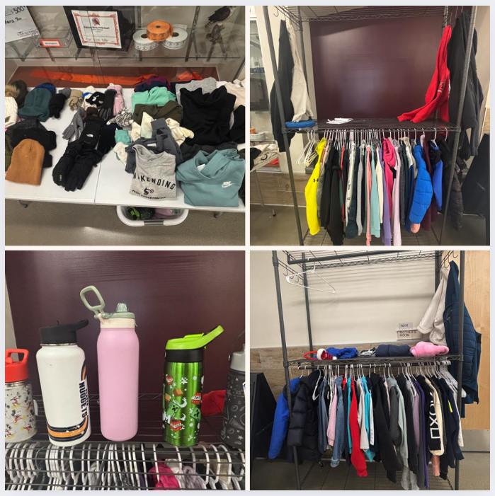 Clothing and water bottles displayed on tables and racks in a community space, showcasing various items for donation.