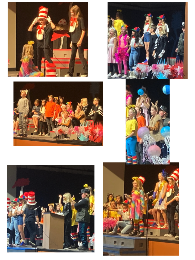 A lively school performance featuring children in colorful costumes, singing and acting on stage with vibrant decorations.